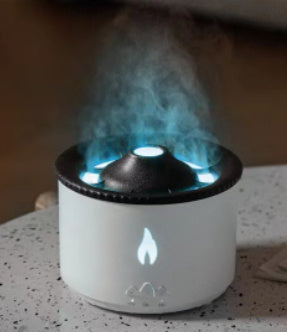 White and black humidifier emitting steam on a blurred background