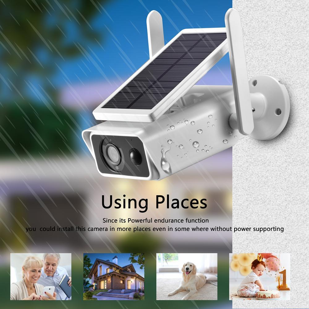 Solar-powered security camera with raindrops on a blurred outdoor background